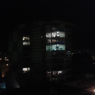 ACROSS THE WAY: Apartments with their lights on.