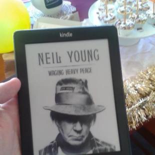 YOUNG AT HEART: My birthday present from my gorgeous de facto was Neil Young's autobiography loaded on to a spanking new Kindle. I'm officially a futurist.