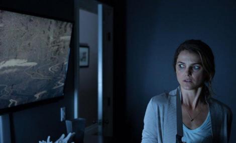 CHEAP THRILLS: Keri Russell stars in the sci-fi spookfest Dark Skies.