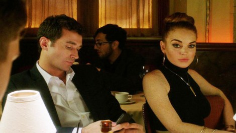 POLITE SOCIETY: James Deen and Linsday Lohan fein interest during the opening scene of The Canyons.