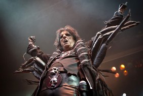 FEEDING TIME: Alice Cooper dons his spider costume.